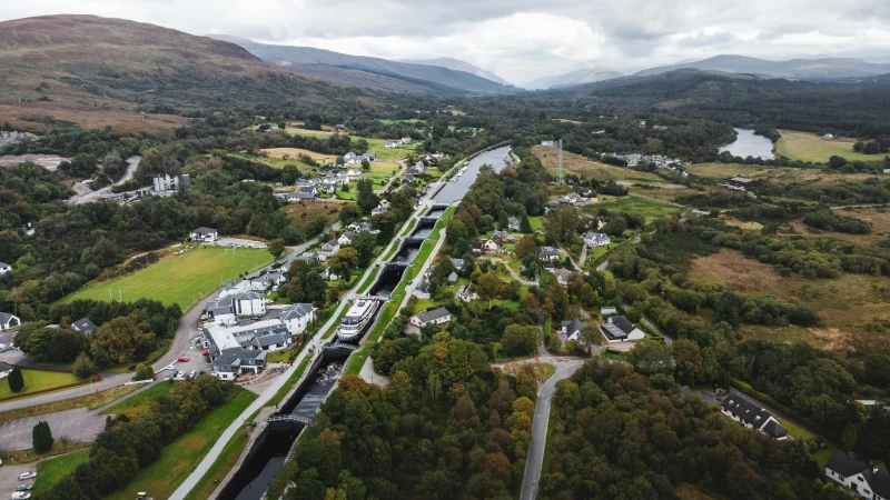 Scenic aerial photograph showcasing Fort William's landscape with locks and lush greenery in Scotland.