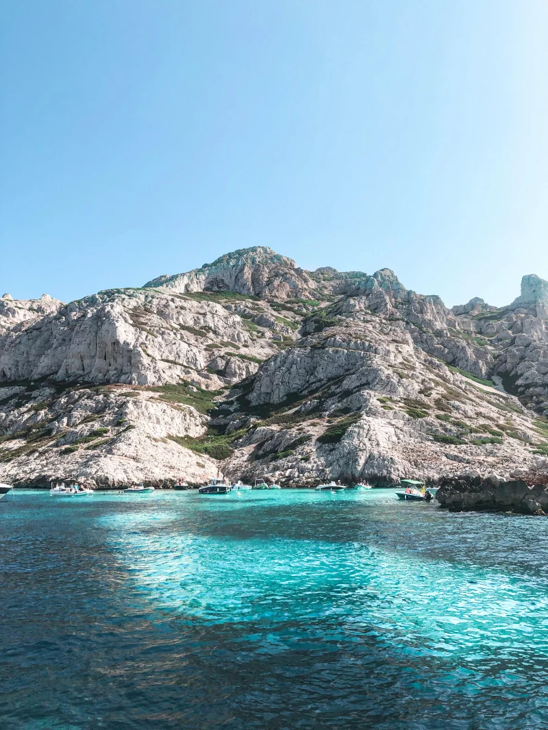 Breathtaking view of a rocky Mediterranean island coastline with turquoise waters.