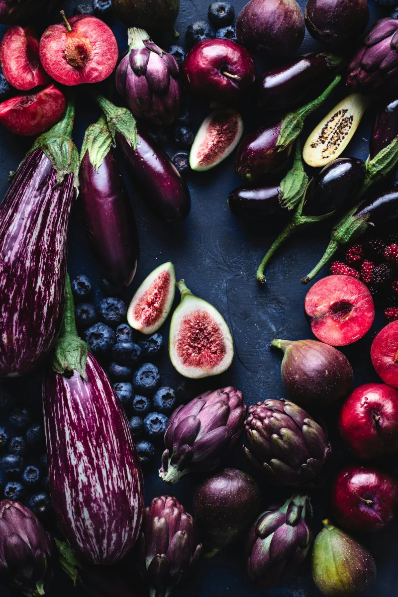 A stunning display of colorful fruits and vegetables highlighting natural textures and freshness in a still life composition.