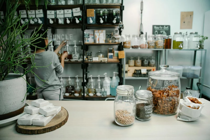 Inside an organic food store with jars and eco-friendly items on display.