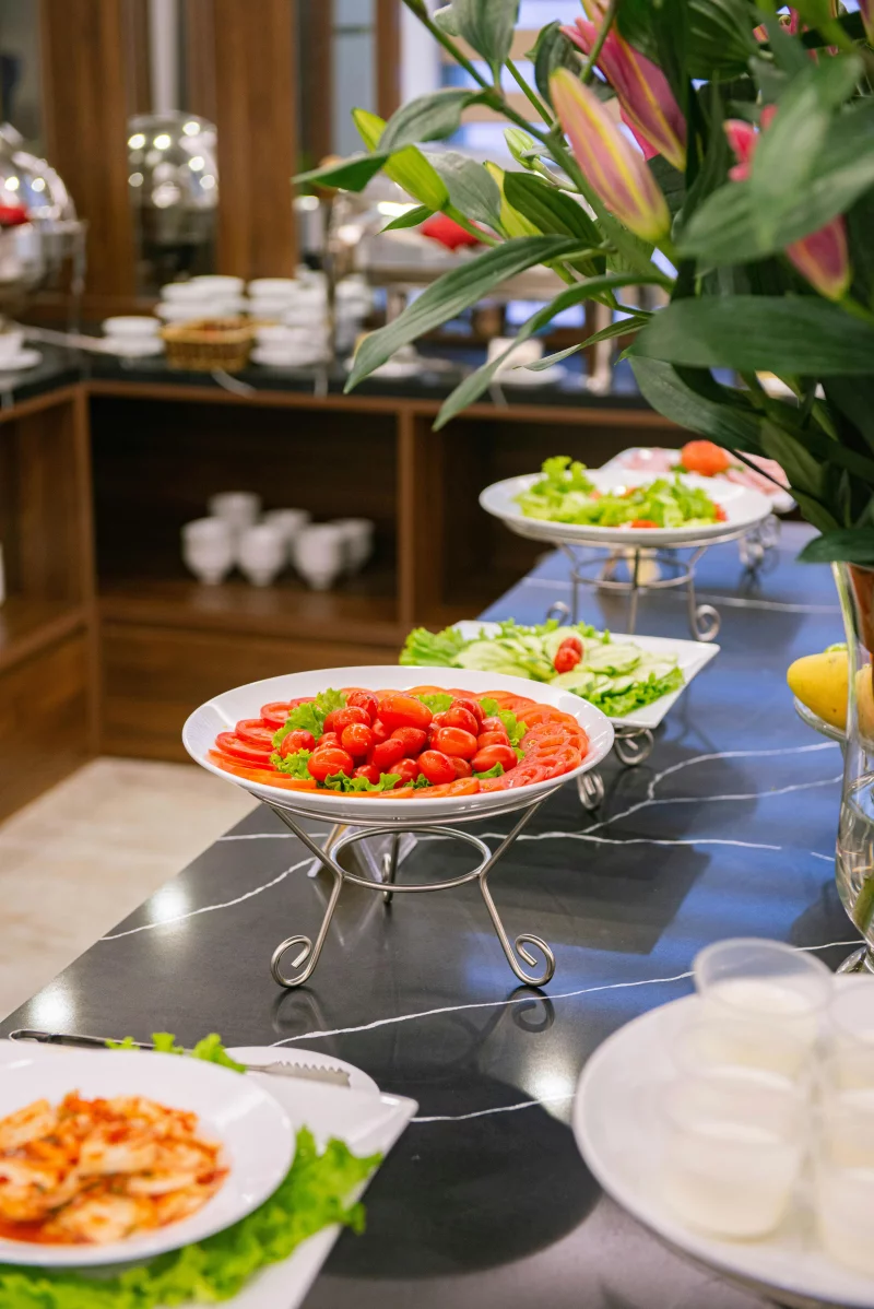 Vibrant vegetable buffet with fresh salads in a Hà Nội restaurant, perfect for healthy dining.