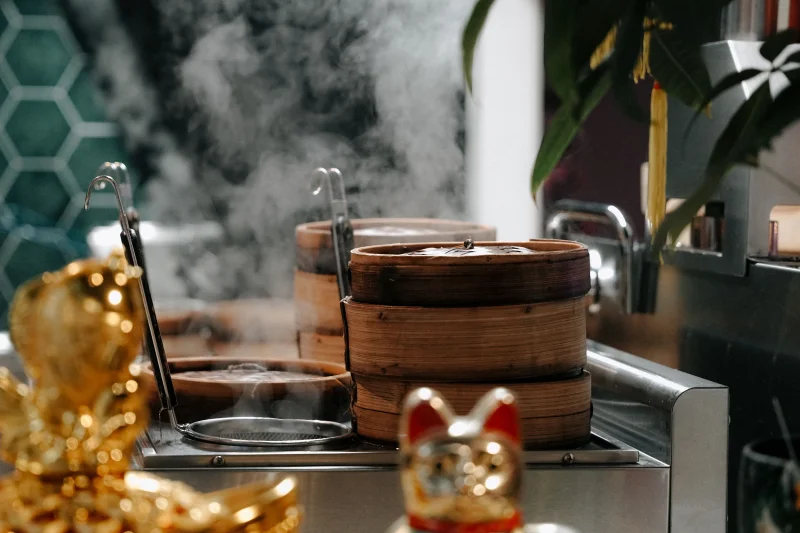 Close-up of steaming bamboo baskets in an Asian restaurant in Amsterdam.